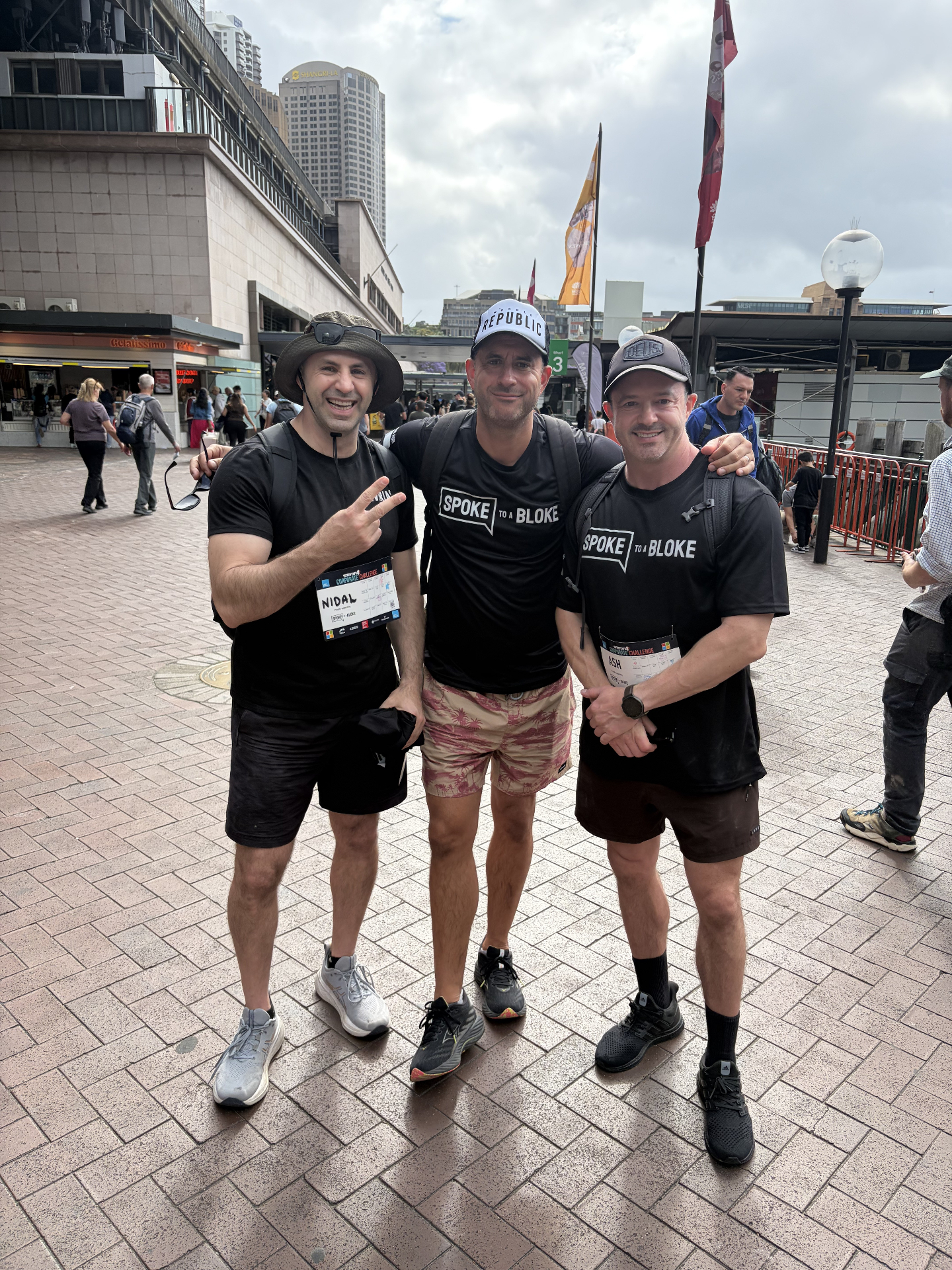 Three walkers in Spoke to a Bloke shirts in Sydney